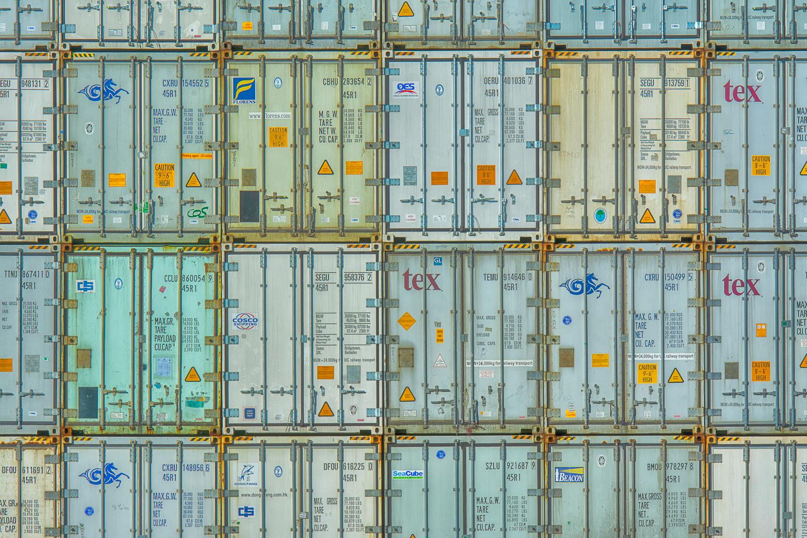 Stacked shipping containers in a cargo terminal